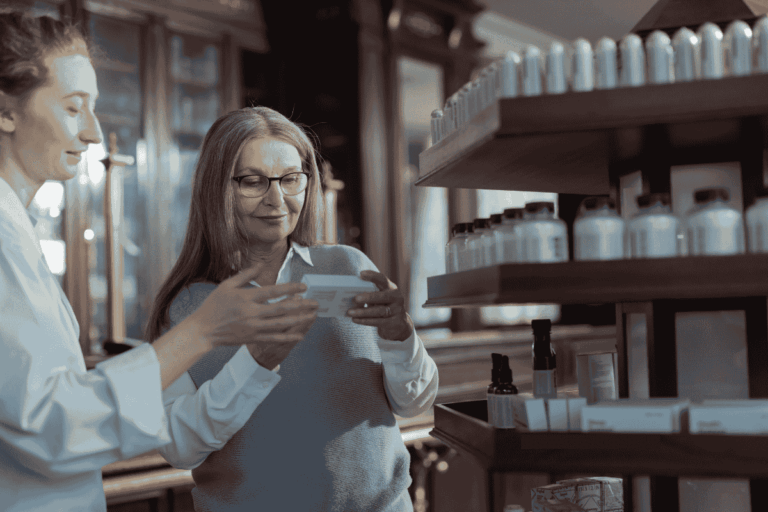 pharmacist explains prescription to patient or employee