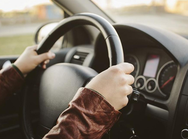 Hand on the Steering Wheel