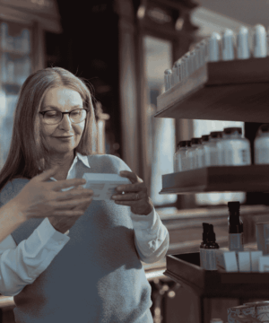 pharmacist explains prescription to patient or employee