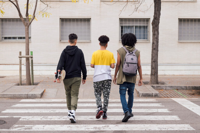 Students walking in a crosswalk